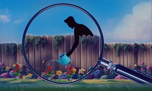 Magnifying glass highlighting work for one company while outsourcing supports another, showing software development outsourcing services.